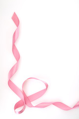 Curled Pink Ribbon On White