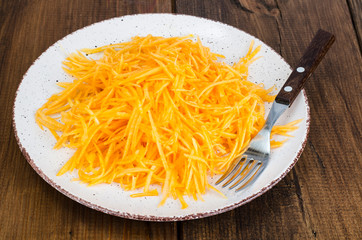 Vegetarian salad of fresh organic pumpkin, raw food