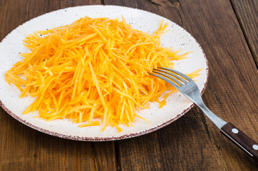 Vegetarian salad of fresh organic pumpkin, raw food