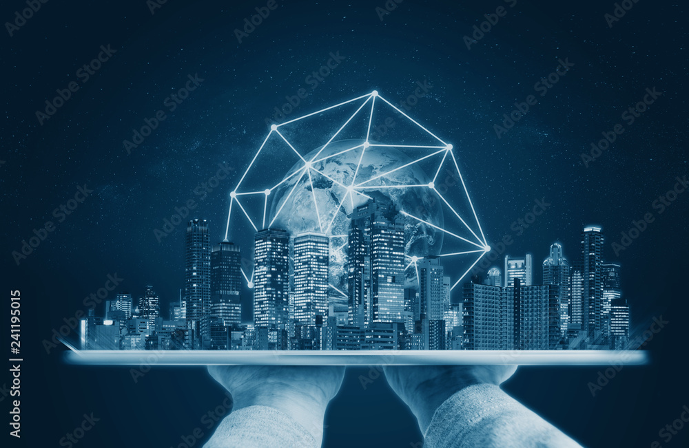 Aufkleber hands holding digital tablet with buildings and global network connection technology. element of thi
