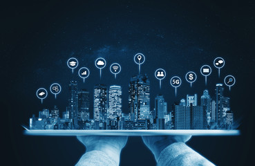 Augmented reality technology,  Modern buildings hologram and technology icons. Smart city, internet and networking smart technology