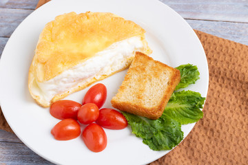vegetable salad and omellete from beaten eggs