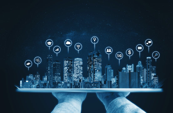 Augmented reality technology,  Modern buildings hologram and technology icons. Smart city, internet and networking smart technology