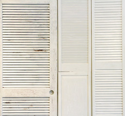 White Wooden Shutters on the Wall