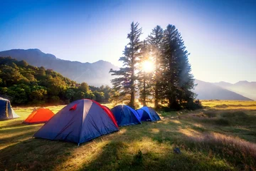 Fotobehang Campsites are places to relax, enjoy and explore the outdoors. Many campsites are found in New Zealand. Choose from alpine forest, lakeshores and sandy beaches. This is popular among nature-lovers. © Skyimages