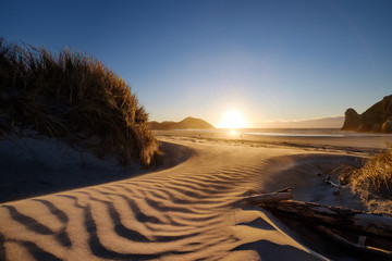 A wonderful place to visit in New Zealand. An amazing beach accessed through walk bushes and sand...