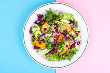 Plate with salad on bright background