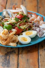 seafood papaya salad dish
