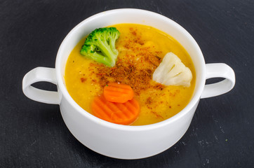 Vegetable soup puree on  black background