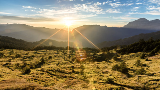 Hehuanshan, Taiwan Is A Popular Destination For The Local People. One Can Enjoy Magnificent Sunrise, Mountain Ranges, Alpine Landscape, And Beautiful Windy Roads. The Sun Provides Warmth To The Place.