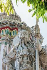 Stone Thai-Chinese style sculpture and thai art architecture in Wat Phra Chetupon Vimolmangklararm (Wat Pho) temple, Thailand. 