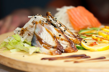 beautiful sushi, rolls, with caviar and fresh fish, close-up