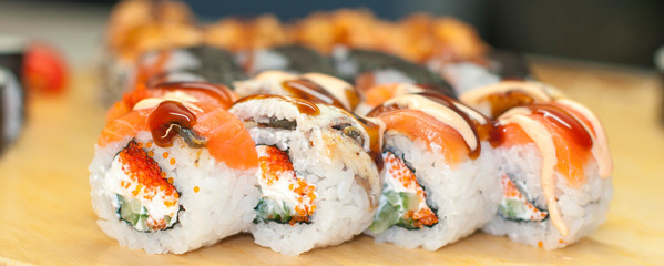 beautiful sushi, rolls, with caviar and fresh fish, close-up