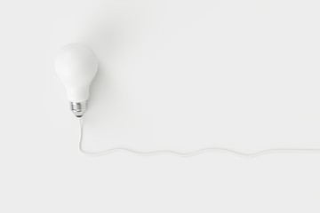 Minimal concept. outstanding white light bulb with cable on white background for copy space.