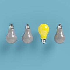 Think different. outstanding yellow light bulb with grey light bulb on blue background. minimal concept