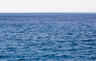 beautiful sea, blurred ocean, bokeh, on sunset background, closeup