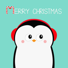 Merry Christmas. Penguin head face. Red headphones hat. Happy New Year. Cute cartoon kawaii baby character. Arctic animal. Flat design. Hello winter. Blue background.