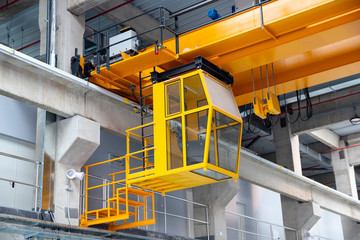 Indoors overhead crane with a cabin