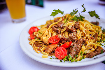 Fresh Mediterranean pasta with beef, Italy