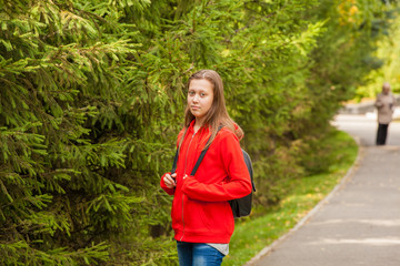 stylish modern teenager girl for a walk