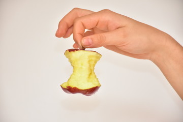 hold an apple in your hand,
