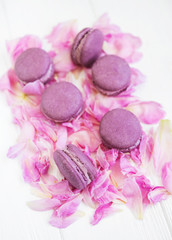 Pink peony petals with macarons