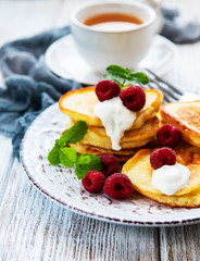 Delicious pancakes with raspberries