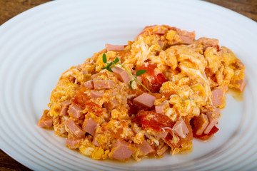 Scramble with sausages