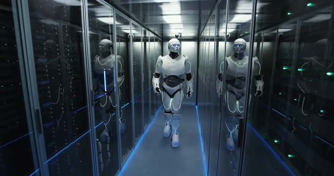 View of human-like white robot in hallway of server room among racks in data center working with hardware