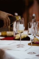 A glass of white champagne sparkling bubble wine