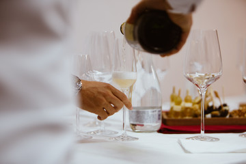 A glass of white champagne sparkling bubble wine