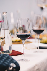 A glass of red rose and white wine