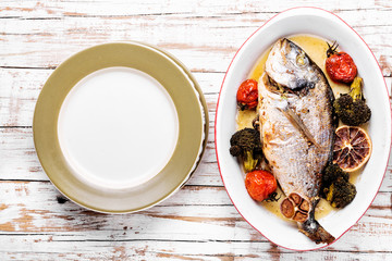 Baked in oven sea fish dorado