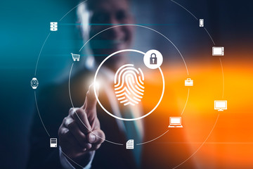 Biometric security concept with fingerprint identification scan and facial recognition. Businessman selecting modern interface.