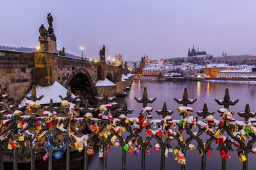 Prague. Many love locks on the fence, a heart lock on the Charles Bridge.