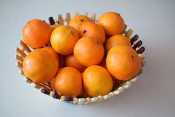 Juicy tangerines on a plate