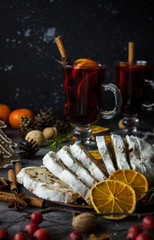 Traditional stollen and milled Hot wine cake and Christmas decorations