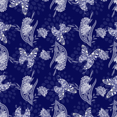  Seamless texture. Multicolor pattern of butterflies, flowers and leaves. Embroidery colorful simplified. monochrome blue tint