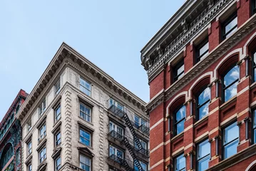 Fotobehang Typical buildings in Soho in New York © jjfarq
