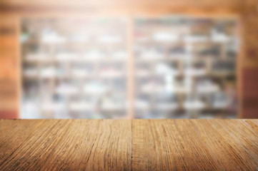 empty wooden table with blur restaurant background
