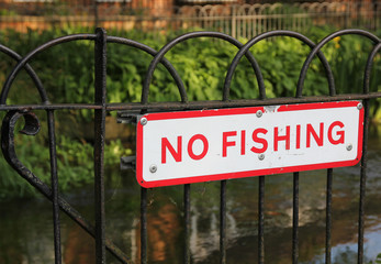 No Fishing Sign on Railings