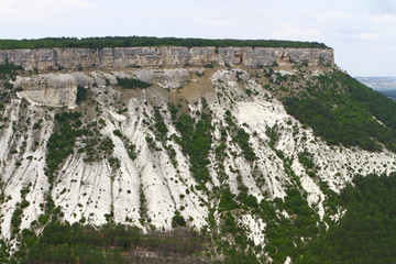 nice mountain slope with bright blue sky, natural landscape photo