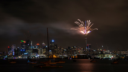 Auckland city skyline with fireworks display from the landmark Skytower