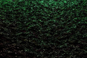 fantastic celebratory bright water in the night with lights reflection - abstract background of electric lights reflected in black liquid