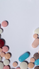 Colorful pills on white background. Legal drugs