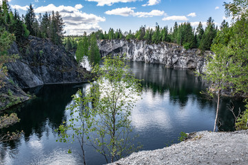 Artificial marble canyon filled with water