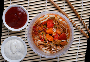 asian carpet and two chopsticks