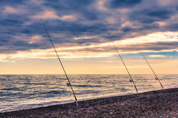Fish rods beach sunset