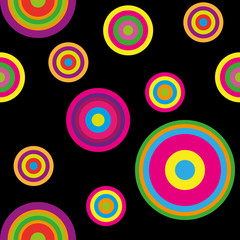 seamless background of concentric circles in neon colors on black