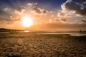 Sea and beach in the sunset.